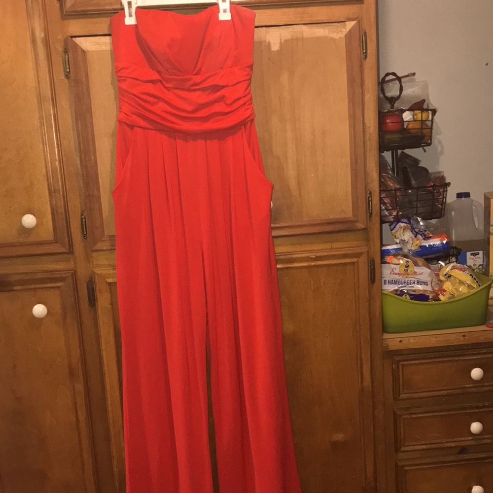 Fun yet elegant Scarlett red strapless jumpsuit with pockets